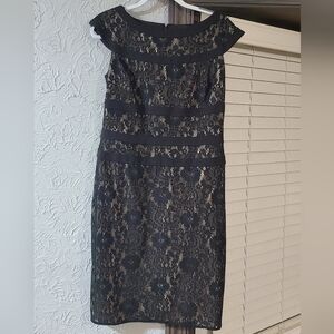 Adrianna Papell black lace sheath dress featuring a cap-sleeve, ribbon trim